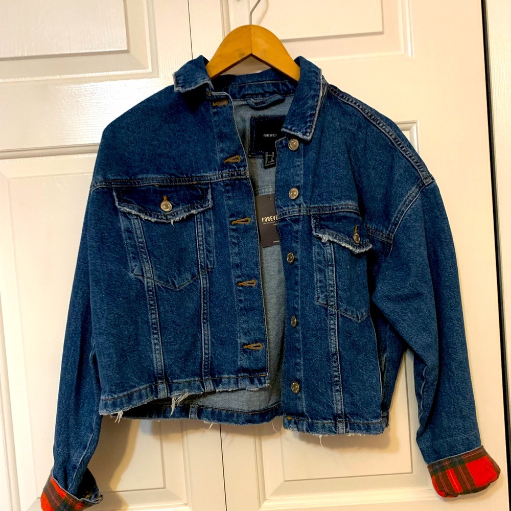 Slightly cropped *NEW WITH TAGS* Jean jacket with plaid cuffs optional.